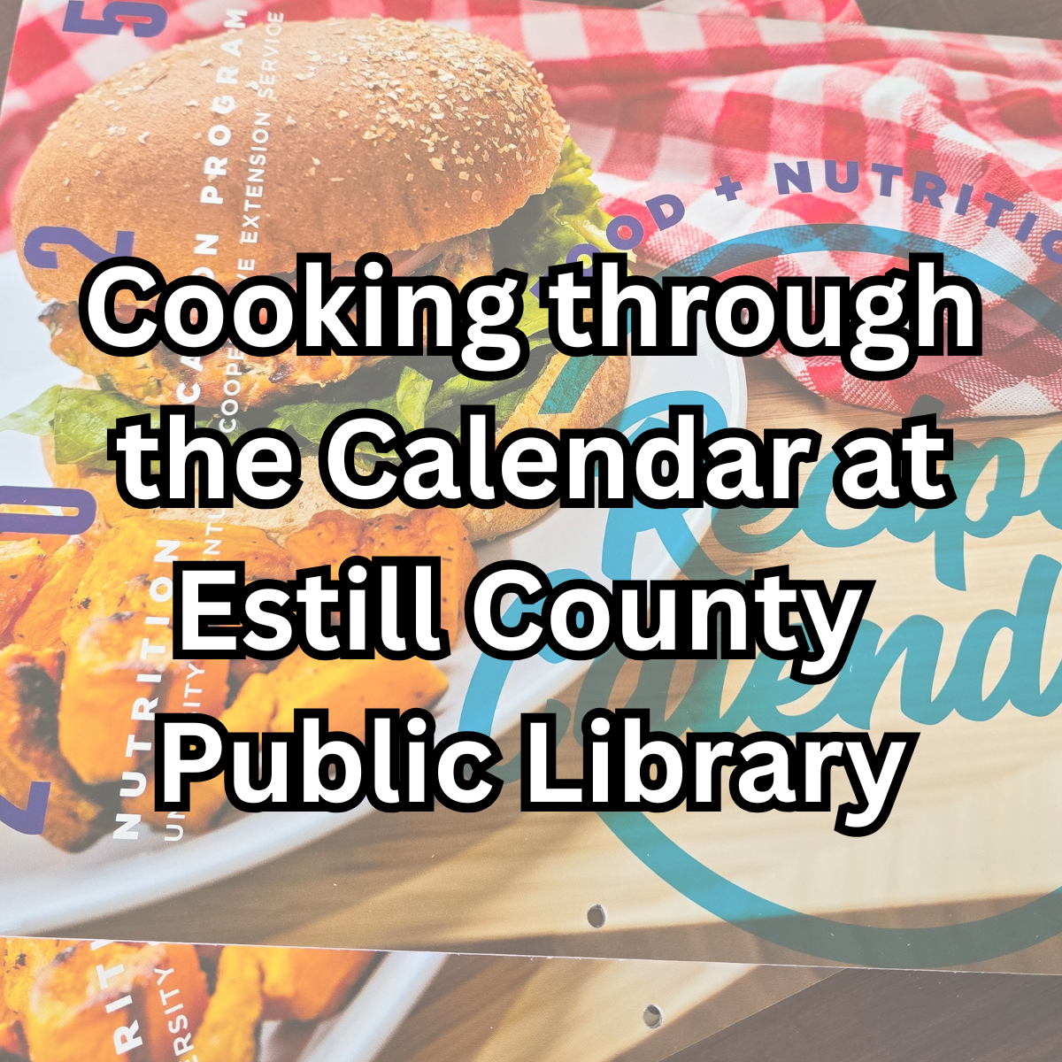 Calendar with words Cooking through the Calendar at Estill County Public Library on top