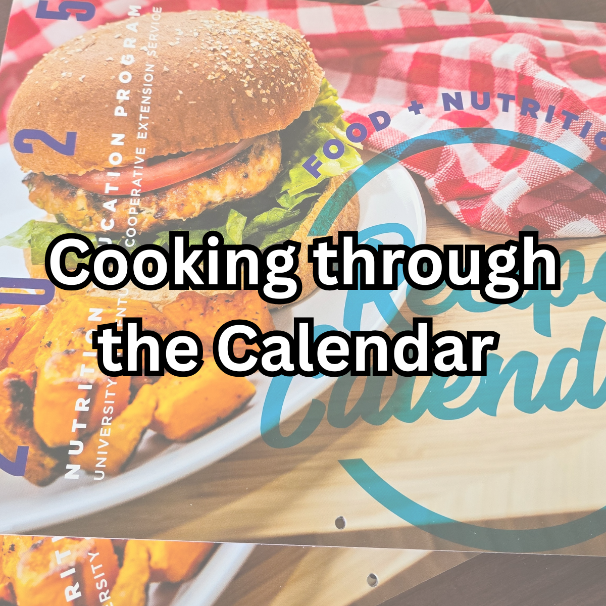 Food and nutrition calendar with the words Cooking through the calendar on top